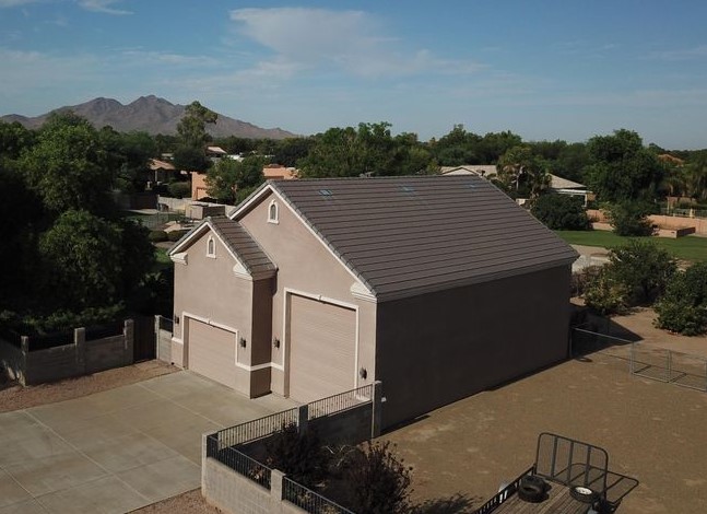 Home with dedicated RV and toy garage bays